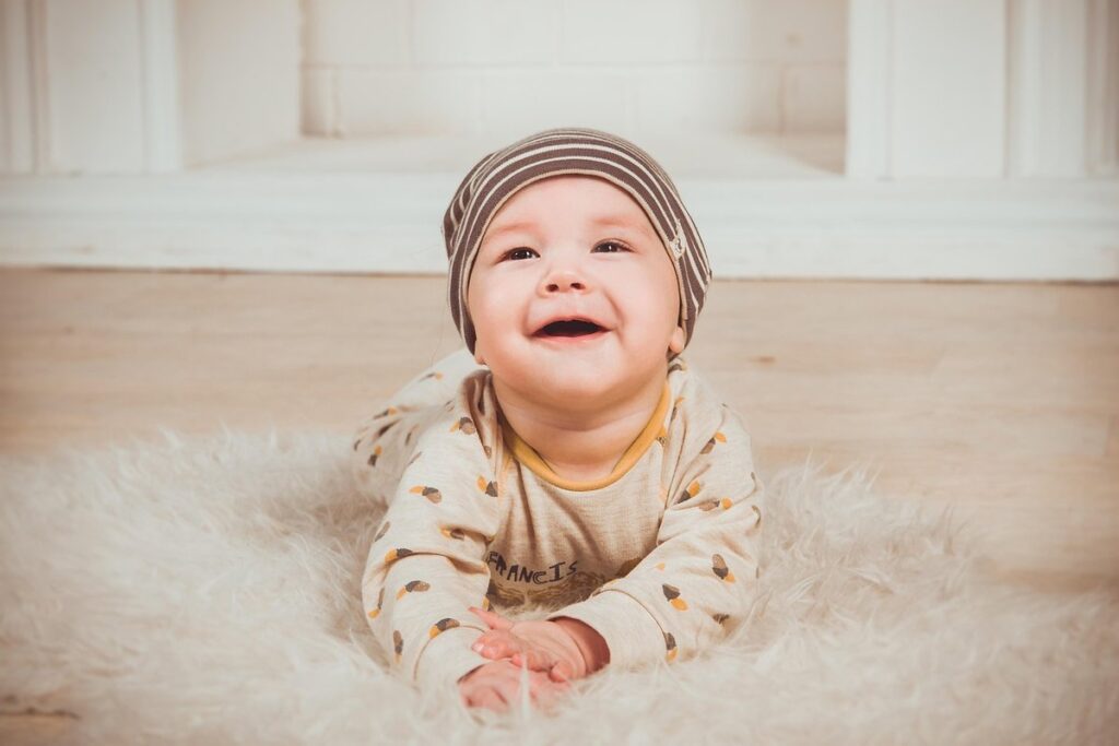 when do newborns smile