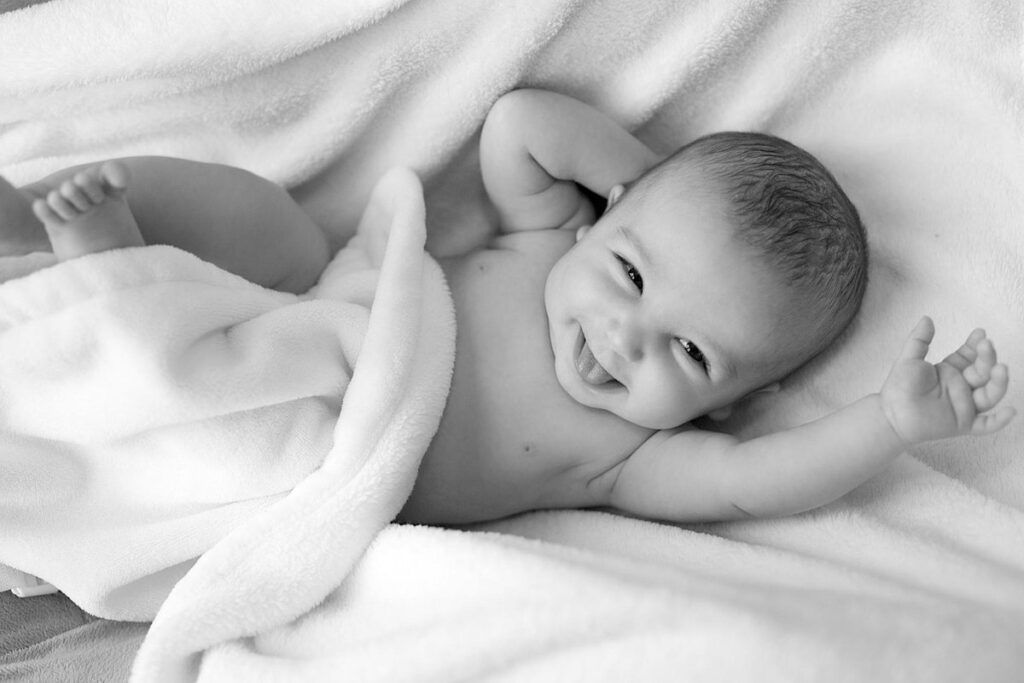 newborn smiling at 1 week